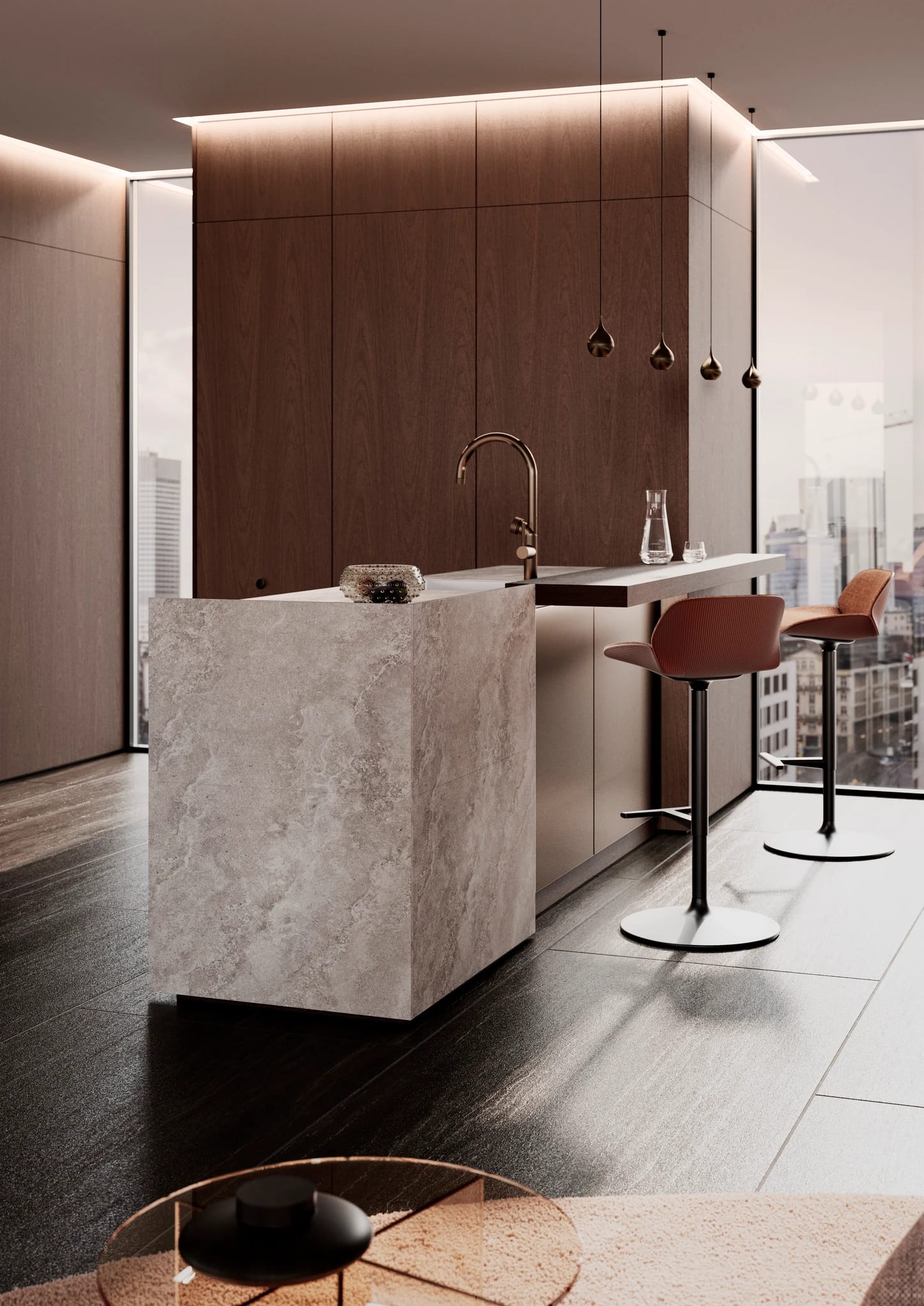 Stone island with bronze bar stools under pendant lights