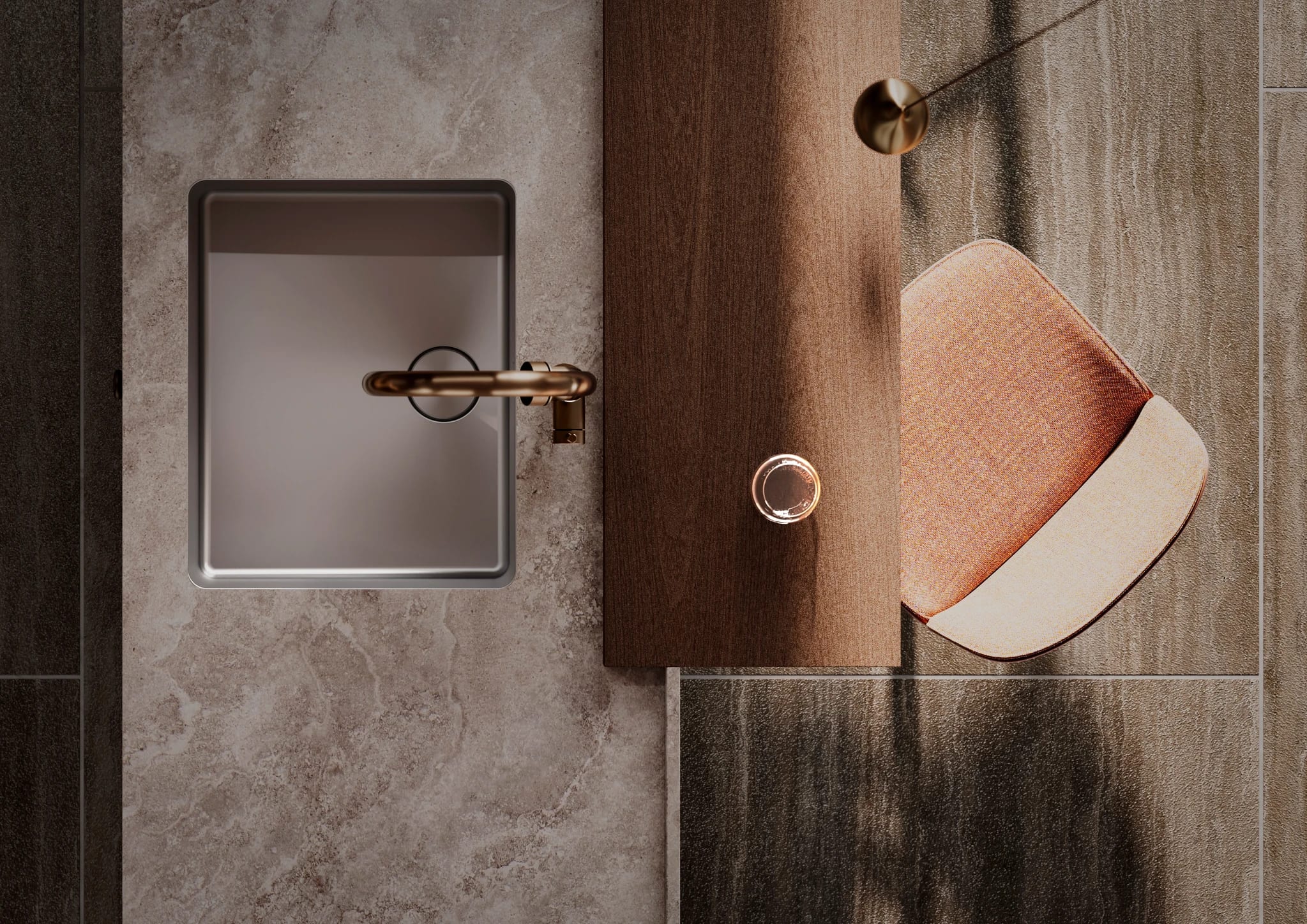 Top view of stone counter, brass tap and walnut board